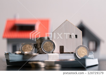 Business home concept involves strategic financial management money coin save bank real estate economic loan investment development growth encourage accountancy buy income stack investment economy 128729179
