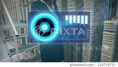 Manipulating floating digital interface, woman working server room with patch panels and cables 128729715