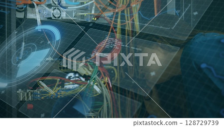 Displaying colorful patch cables with RJ45 connectors at server rack, featuring holographic HUD 128729739