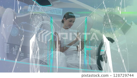 Operating engineer in control seat using holograms in cockpit, digital readouts and car blueprint Operating engineer in control seat using holograms in cockpit, digital readouts and car blueprint 128729744