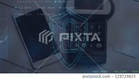 Image of graphs and digital padlock over smartphone with copy space and payment terminal 128729825