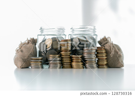 Business save money coin growth concept involves strategic financial management investment loan bank real estate economic development encourage buy income stack investment economy return accountancy Business save money coin growth concept involves strategic financial management investment loan bank real estate economic development encourage buy income stack investment economy return accountancy 128730316