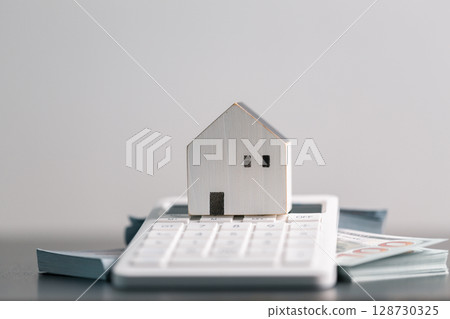 Business home concept involves strategic financial management money coin save bank real estate economic loan investment development growth encourage accountancy buy income stack investment economy 128730325