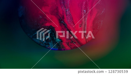 Emulsion spilling. Flowing paint. Defocused pink blue neon color glitter water floating on abstract creative bokeh light background. Emulsion spilling. Flowing paint. Defocused pink blue neon color glitter water floating on abstract creative bokeh light background. 128730539