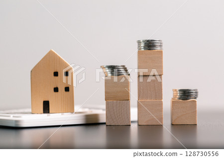 Business home concept involves strategic financial management money coin save bank real estate economic loan investment development growth encourage accountancy buy income stack investment economy 128730556
