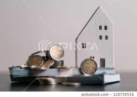 Business home concept involves strategic financial management money coin save bank real estate economic loan investment development growth encourage accountancy buy income stack investment economy 128730558