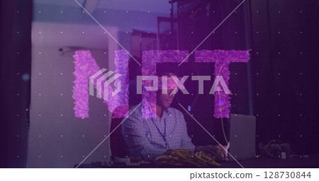 Image of nft text and data processing over african american male it engineer by computer servers 128730844