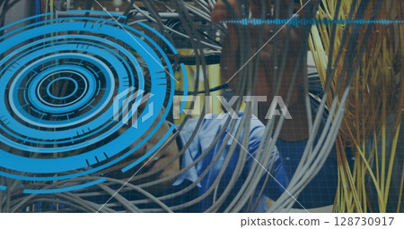 Image of processing circle and data over caucasian man checking servers 128730917