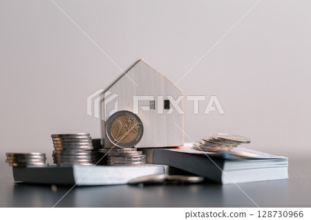 Business home concept involves strategic financial management money coin save bank real estate economic loan investment development growth encourage accountancy buy income stack investment economy 128730966