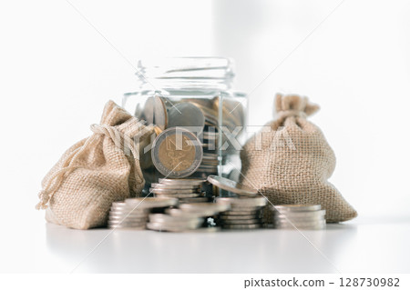 Business save money coin growth concept involves strategic financial management investment loan bank real estate economic development encourage buy income stack investment economy return accountancy 128730982