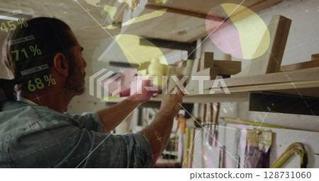 Image of data processing over caucasian male carpenter working in workshop 128731060