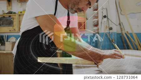 Image of circular scanner data processing over caucasian male carpenter working in workshop 128731064
