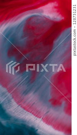 Mix splatter. Flowing paint. Defocused blue red colorful liquid marble shiny particles water fluid spreading on abstract background. 128731231