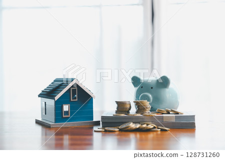 Concept of saving money involves finance, calculating tax, loan and bank services, coins and business strategies. growth encourage accountancy save buy income stack investment economy return Concept of saving money involves finance, calculating tax, loan and bank services, coins and business strategies. growth encourage accountancy save buy income stack investment economy return 128731260