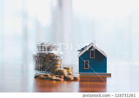 Concept of saving money involves finance, calculating tax, loan and bank services, coins and business strategies. growth encourage accountancy save buy income stack investment economy return Concept of saving money involves finance, calculating tax, loan and bank services, coins and business strategies. growth encourage accountancy save buy income stack investment economy return 128731261