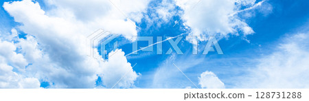 A refreshing summer sky with blue skies and contrails 128731288