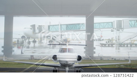 Image of plane on the runway over airport Image of plane on the runway over airport 128731422