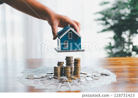 Business home concept involves strategic financial management money coin save bank real estate economic loan investment development growth encourage accountancy buy income stack investment economy Business home concept involves strategic financial management money coin save bank real estate economic loan investment development growth encourage accountancy buy income stack investment economy 128731423