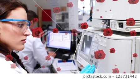 Image of roses over caucasian female scientist using computer equipment Image of roses over caucasian female scientist using computer equipment 128731448