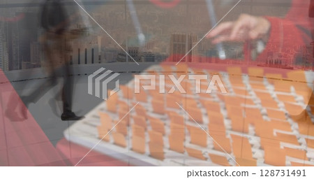 Image of hands of people searching for cards over timelapse with businesspeople walking 128731491