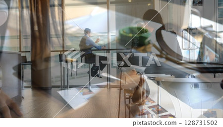 Image of hands of caucasian female designer over diverse businesspeople Image of hands of caucasian female designer over diverse businesspeople 128731502