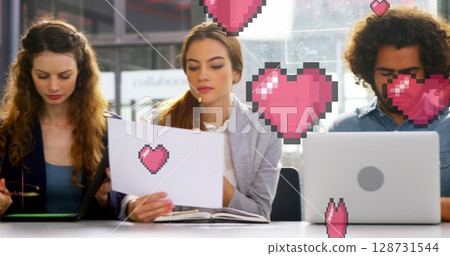 Image of falling hearts over diverse group of business people 128731544