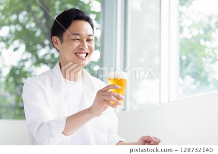 Male drinking beer Male drinking beer 128732140