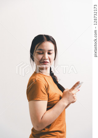 Asian girl expresses dislike, person express negative feeling, concept business complaint from customer ensuring employee satisfaction negative feedback to prevent mental strain customer dislike 128732173
