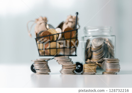 Business save money coin growth concept involves strategic financial management investment loan bank real estate economic development encourage buy income stack investment economy return accountancy 128732216