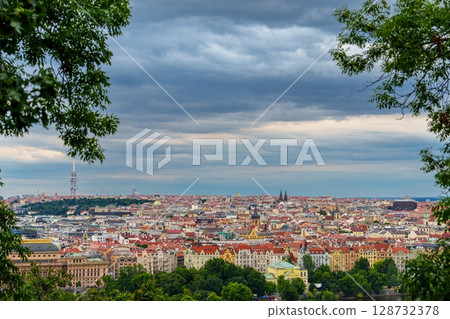 Picturesque Prague, Czechia Cityscape under Dramatic Sky A Breathtaking View of Urban Landscape 128732378