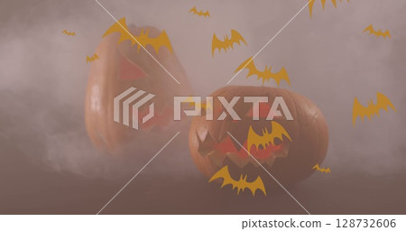 Image of bats icons over halloween pumpkins 128732606