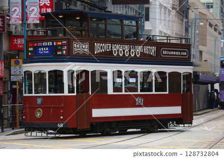 The tram (streetcar) is the everyday vehicle of Hong Kong's common people. This vehicle is for tourists. You can also party here. 128732804