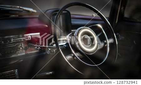 Vintage Classic car steering wheel, with chrome and leather textures in sharp detail, showcases the quality and precision of automotive craftsmanship under natural light. Vintage Classic car steering wheel, with chrome and leather textures in sharp detail, showcases the quality and precision of automotive craftsmanship under natural light. 128732941