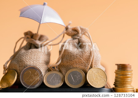 Insurance background money coin concept business protection finance sale financial investment buy automobile purchase loan deal agent rent rental premium assurance save banking tax return calculation 128733104