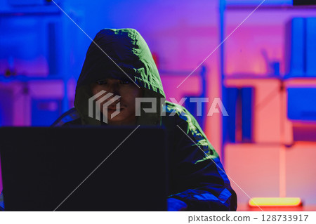 Hacker cyberattack data breach security threat digital crime 128733917