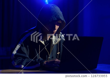 Hacker cyberattack representing data breach and cybersecurity threat in digital system Hacker cyberattack representing data breach and cybersecurity threat in digital system 128733955