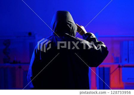 Anonymous hacker thief criminal man Anonymous hacker thief criminal man 128733956
