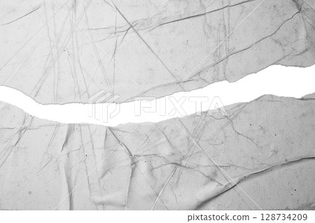 Gap of a ripped white paper on a white background. Copy space Gap of a ripped white paper on a white background. Copy space 128734209
