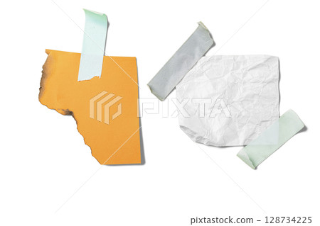 Burnt orange paper and white crumpled paper on adhesive masking tape isolated over a white background. Copy space 128734225