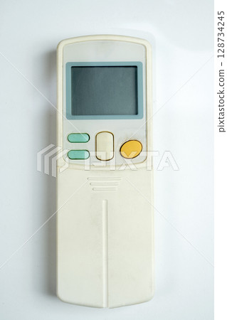 Modern remote control air conditioner on a white background. Top view 128734245