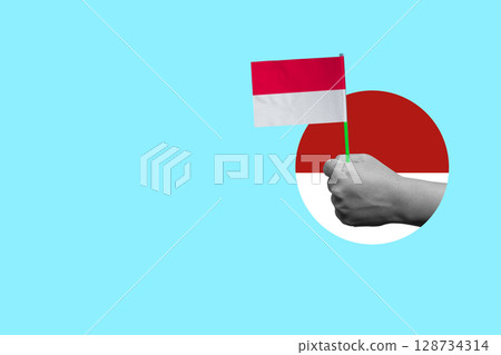 Human hand holding the Indonesian flag to celebrate Indonesia Independence Day. Collage art. Concept of Kemerdekaan 128734314