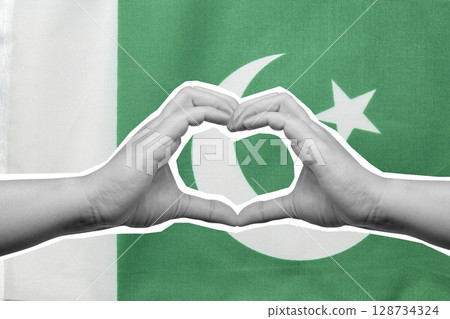 Human hand showing heart gesture with the Pakistan national flag. Concept of Pakistan Independence Day. Collage art Human hand showing heart gesture with the Pakistan national flag. Concept of Pakistan Independence Day. Collage art 128734324
