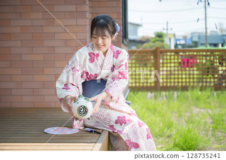Mosquito coil and woman Mosquito coil and woman 128735241