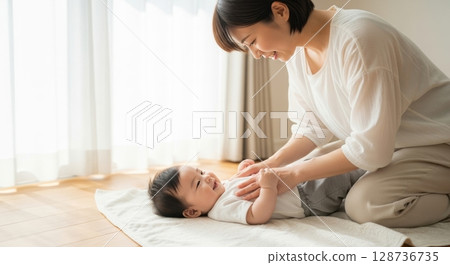 Baby massage for mothers and babies during nursing 128736735