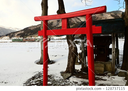 Tono in winter, Kamaishi Line and a small shrine Tono in winter, Kamaishi Line and a small shrine 128737115