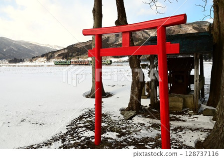 Tono in winter, Kamaishi Line and a small shrine Tono in winter, Kamaishi Line and a small shrine 128737116