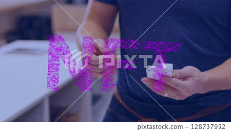 Image of nft text banner over mid section of man making a payment by his credit card 128737952
