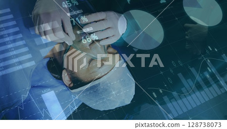 Image of statistical data processing over mid section of surgeon placing oxygen mask on patient Image of statistical data processing over mid section of surgeon placing oxygen mask on patient 128738073