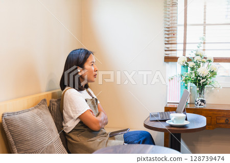 Woman drinking fresh cold water from glass. 128739474