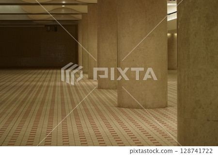 Symmetrical composition of underground pillars and tiles Symmetrical composition of underground pillars and tiles 128741722
